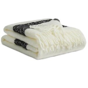 Stripes HBC decorative throw with reusable bag.